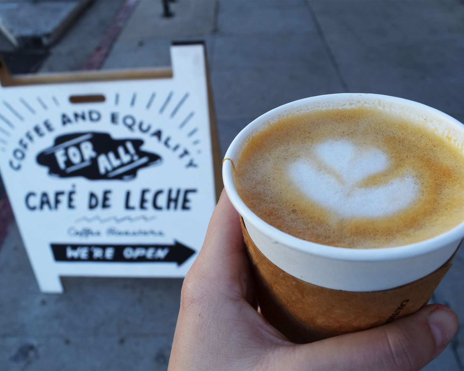 Cafe de Leche - Latte outside the shop